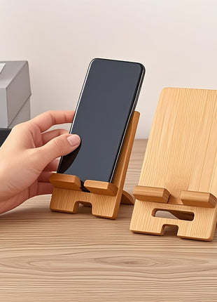 Bambus-Handyhalter, aufgeklappt mit Antirutschpads, trägt ein Smartphone im Hochformat