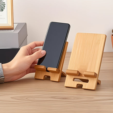 Bambus-Handyhalter, aufgeklappt mit Antirutschpads, trägt ein Smartphone im Hochformat