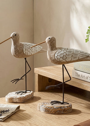 Möwen-Holzfigur-Set auf schwarzen Metallständern, beige/braune Struktur mit Flügelmuster
