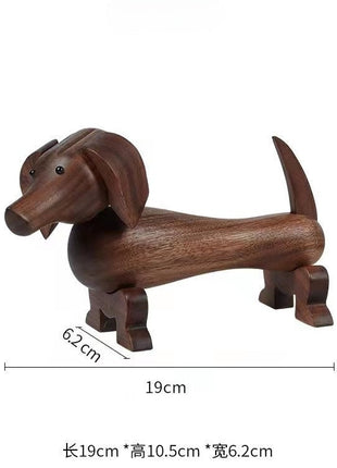 Dackel-Holzfigur aus dunklem Nussbaum, Maße skizziert