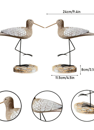 2er-Set Möwen-Holzfiguren mit fein ausgeprägtem Flügelmuster und schwarzen Metallbeinen