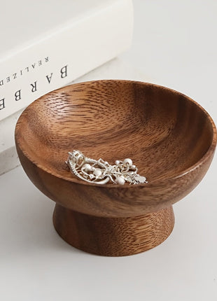 Walnussholz-Ring-Ablage mit Fuß, braune Schale mit Schmuck in der Mulde.