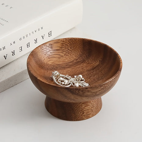 Walnussholz-Ring-Ablage mit Fuß, braune Schale mit Schmuck in der Mulde.