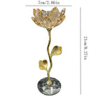 Frontansicht: Kerzenhalter mit champagnerfarbener Lotus-Kristallschale, goldenem Stiel, Steinsockel