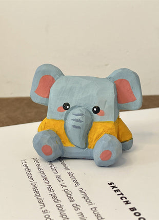 Bleistifthalter Elefant in Hellblau mit gelber Weste, sitzende Figur