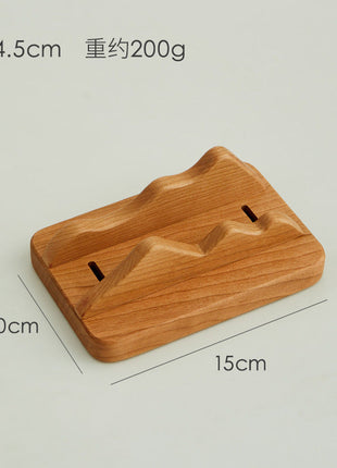 Höhenverstellbarer Laptop-Ständer aus hellem Holz mit Einkerbungen für die Höhenverstellung