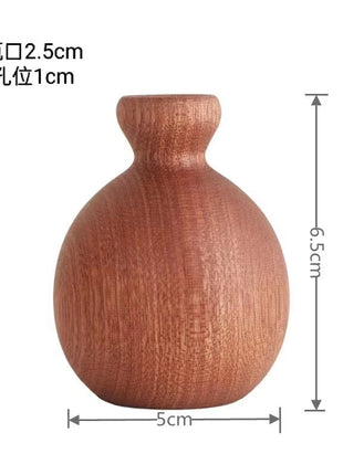 Holzvase mit kugeliger Form, erdiges Braun, ca. 6,5 cm hoch, Bodenöffnung