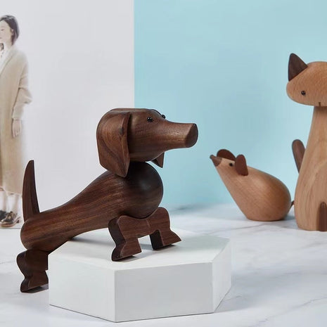 Dackel-Holzfigur mit zwei Metallaugen aus dunklem Nussbaum, sitzend