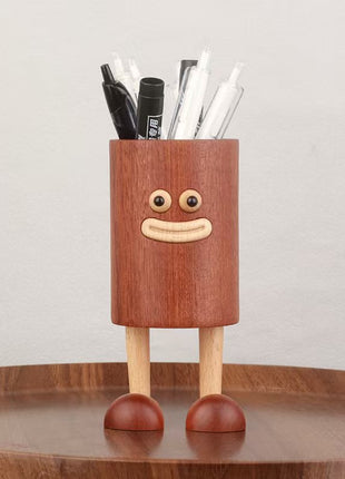 Stifthalter aus Sapeli-Holz mit lustigem Gesicht, Zylinderform und zwei Holzbeinen