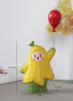Bananen-Mensch mit rotem Ballon