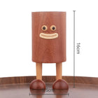 Stifthalter aus Sapeli-Holz, Höhe 16 cm, mit lustigem Gesicht und zwei Holzfüßen