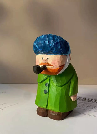 Handgeschnitzte Holzkunstfigur Mann mit blauem Hut, grüner Kleidung und schwarzem Schnurrbart