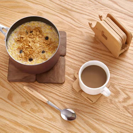 Elefantförmiger Holz-Untersetzer mit Becher-Auflage