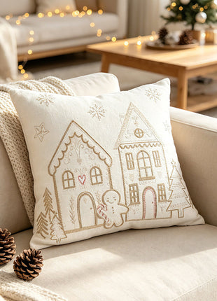 Ivory square Christmas village pillow with stitched houses and snowflakes