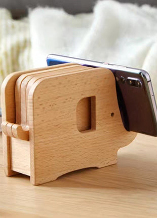 Elefantförmiger Holz-Untersetzer mit Handy in seitlicher Aussparung