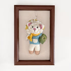Reading sheep charm with a light hanging cord