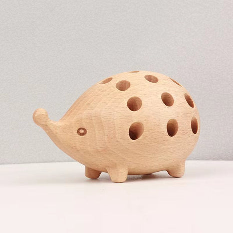 Igel-Stifthalter aus massivem Holz, helles Holz, runde Öffnungen als Stifthalter