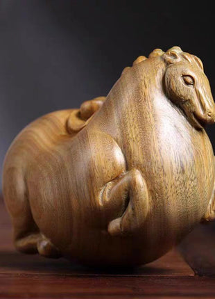 Holzfigur Tang-Pferd, liegend mit nach oben gerichtetem Kopf, goldbraun gebeizt