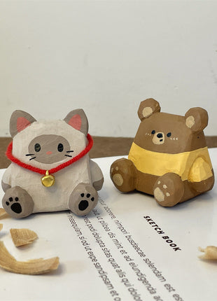 Bleistifthalter-Tierfiguren: Katze mit rotem Band und Bär in Gelb