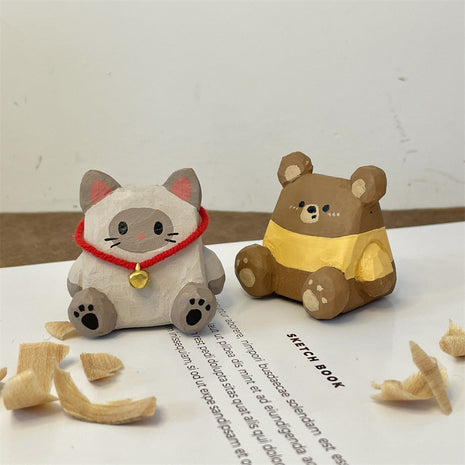 Bleistifthalter-Tierfiguren: Katze mit rotem Band und Bär in Gelb