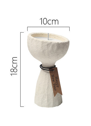 Kerzengefäß cremefarben, Maße ca. 10 cm/18 cm, mit schwarzem Band und Anhänger