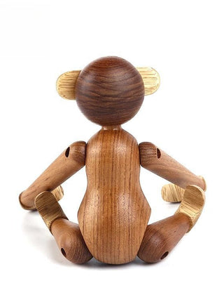 Gelenkige Holzskulptur als Affe von hinten, runde Kopfkugel und Arme