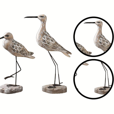 Zwei Möwen-Dekofiguren aus Holz mit Federornament, Metallbeinen und Holzsockel