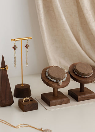 Walnuss-Holz-Armbanduhrenhalter-Set mit mehreren Schmuckständern und rundem Stoffpolster