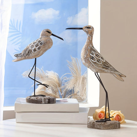 Set aus 2 Deko-Möwenfiguren aus Holz mit Metallbeinen und rundem Sockel, grau-beige