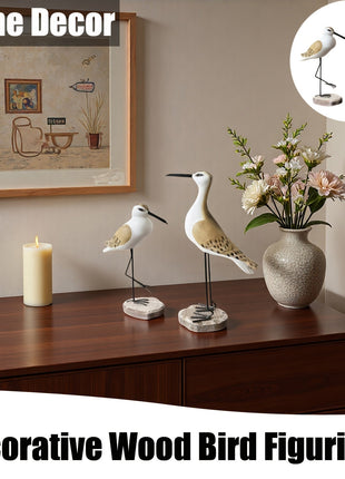 Zwei Seemöwen-Dekofiguren mit Holzsockeln und Metallbeinen, weiß-braune Flügel, fürs Sideboard.