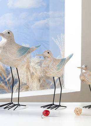 Set aus Holz-Seevögeln mit blauen Akzenten, mehrere Vögel mit schwarzen Metallbeinen
